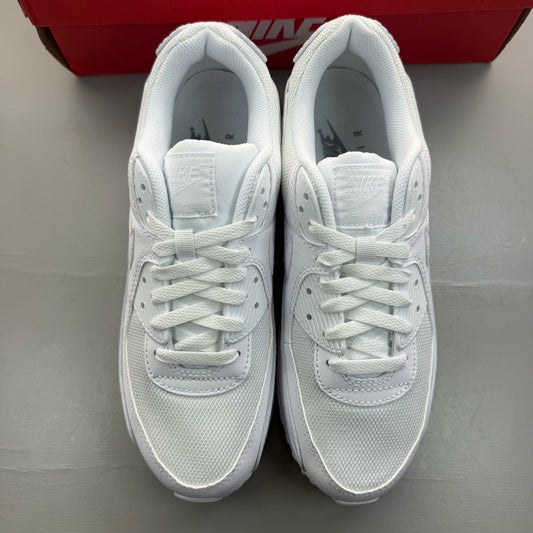Nike Air Max 90 white trainers with iconic swoosh logo and breathable mesh material.