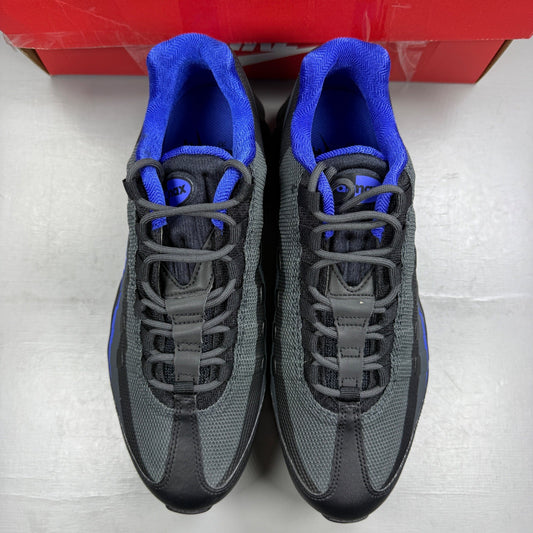 Nike Air Max 95 Ultra black trainers with blue accents and mesh upper.