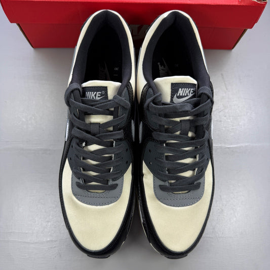 Nike black trainers with crocodile texture and Air Max logo detail.