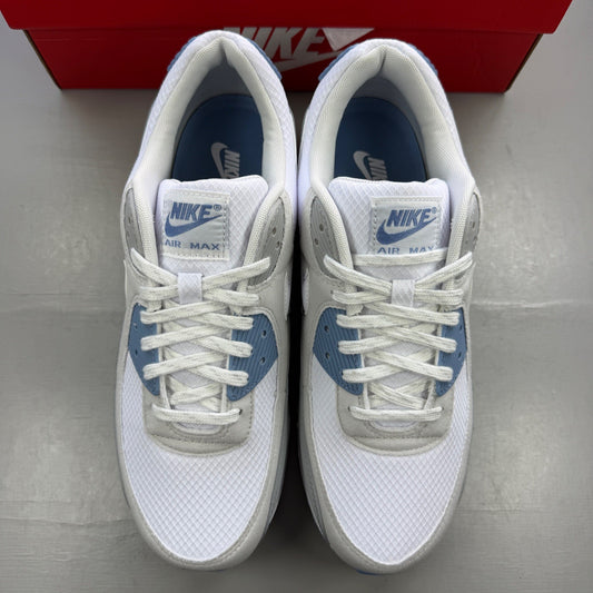 Nike trainers white with smoke grey accents and logo detail.