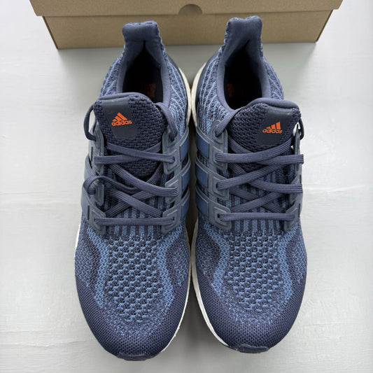 Adidas Ultra Boost 5.0 DNA trainers in navy blue with white accents and logo.