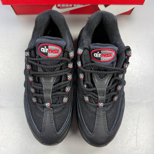 Nike Air Max 95 black trainers with red accents and logo detailing.