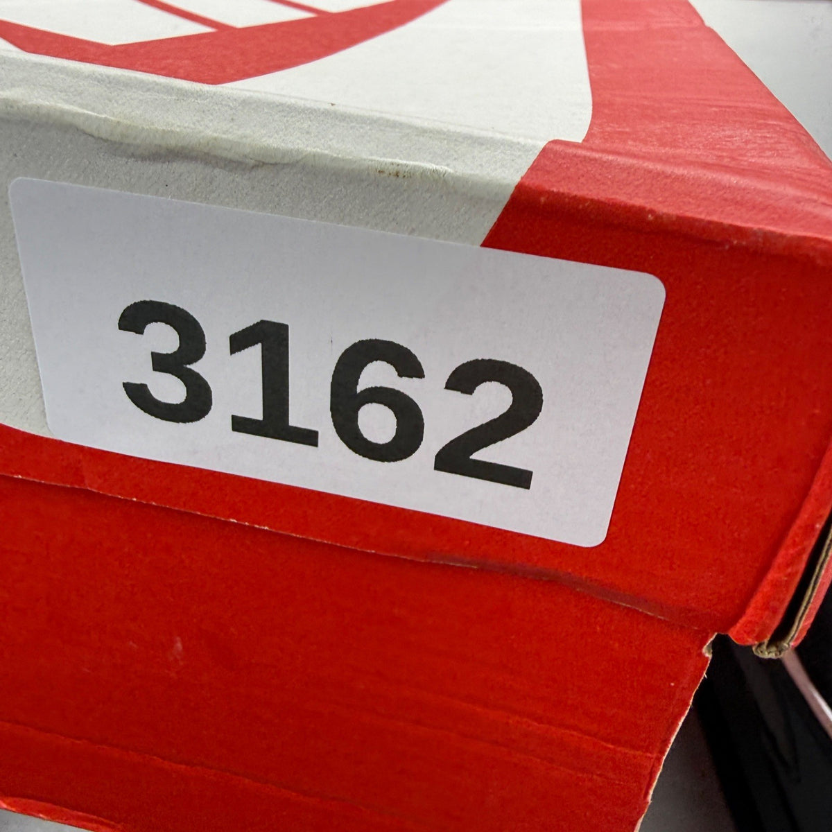 Nike trainers black with neon volt accents and white-grey detailing, featuring iconic logo.