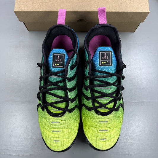 Nike athletic shoes Aurora Green with black accents and signature logo details.