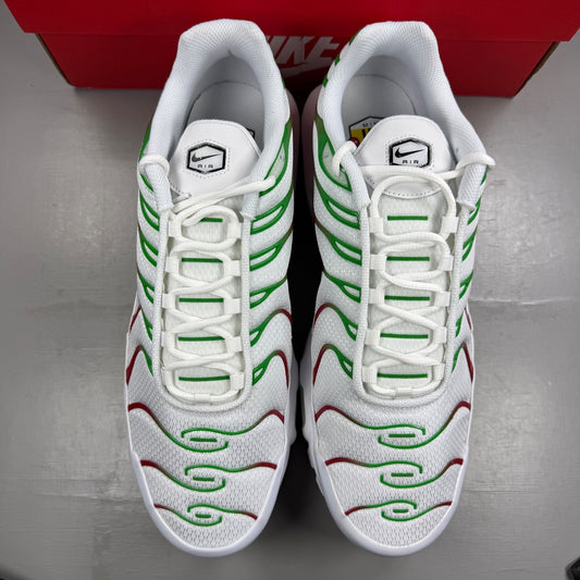 Nike deck shoes white with green and red accents, featuring logo and sleek design.