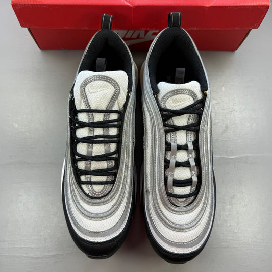 Nike black athletic shoes with metallic silver accents and signature logo detailing.