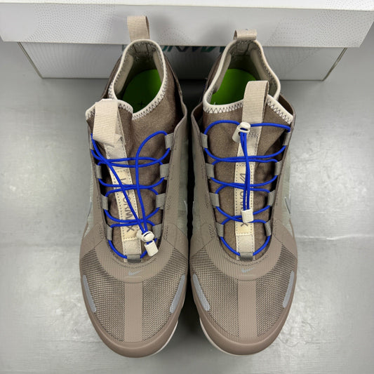 Nike running shoes beige with Air VaporMax sole and utility design.