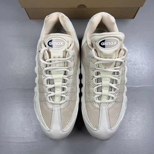 Nike trainers white with big bubble sole and iconic swoosh logo.