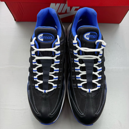 Nike Air Max 95 black trainers with royal blue accents and white detailing.