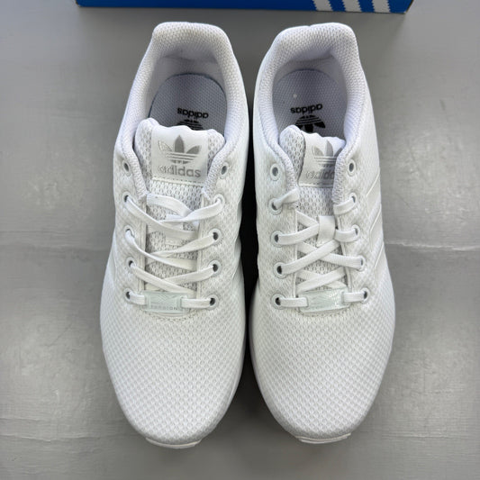 Adidas deck shoes white with mesh upper and signature three stripes logo.