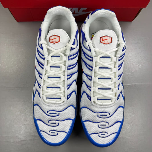 Nike running shoes white with Signal Blue accents and Air Max cushioning.