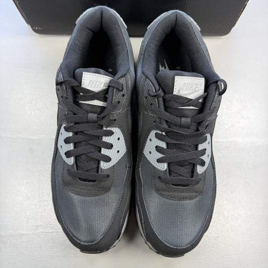 Nike Air Max 90 black trainers with anthracite and cool grey accents, iconic logo.