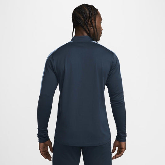 Nike blue Dri-FIT 1/4 zip top with logo and breathable material.