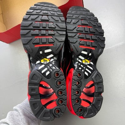 Nike trainers black with blight crimson red accents and signature logo.