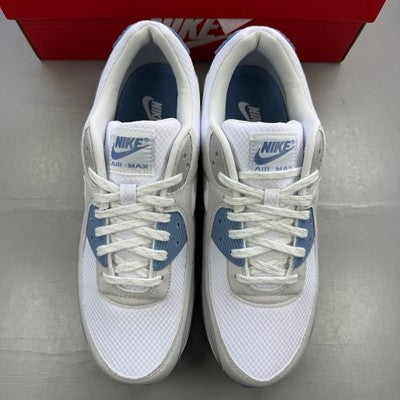 Nike trainers white with smoke grey accents and signature swoosh logo.