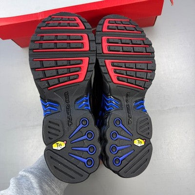 Nike black trainers featuring Spider-Man design, mesh upper, and distinctive Air Max sole.