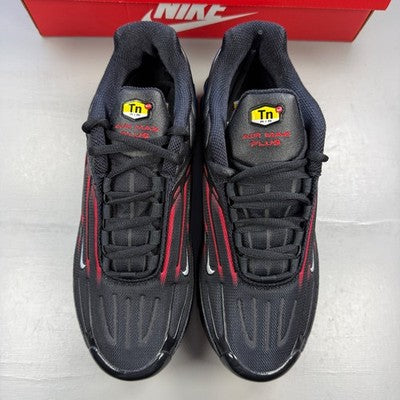 Nike black trainers featuring Spider-Man design, mesh upper, and distinctive Air Max sole.