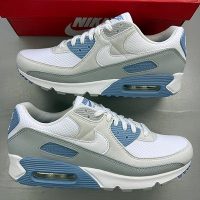 Nike trainers white with smoke grey accents and signature swoosh logo.