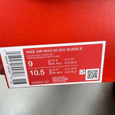 Nike black trainers with grey accents and iconic Air Max bubble sole.