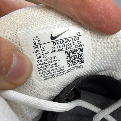 Nike trainers white with comet blue accents and signature logo details.