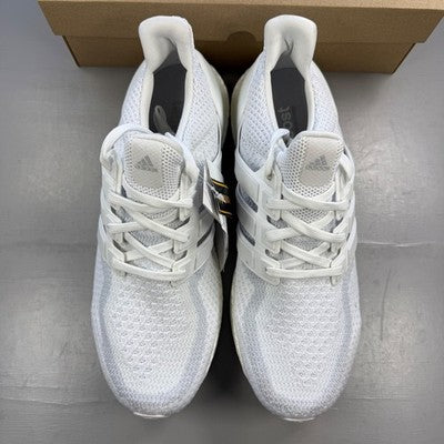 Adidas white trainers with mesh upper and Boost cushioning technology.