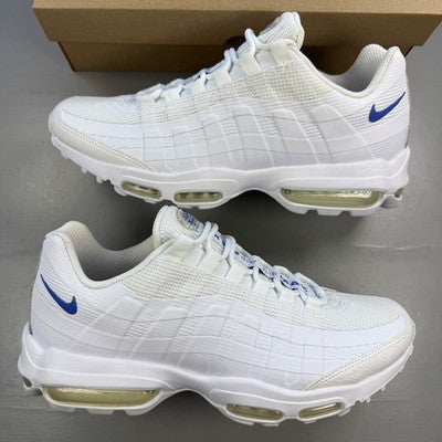 Nike trainers white with comet blue accents and signature logo details.