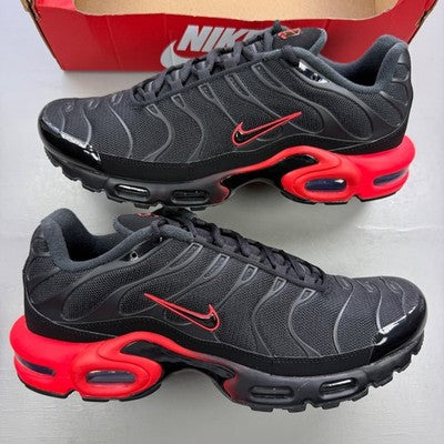 Nike trainers black with blight crimson red accents and signature logo.