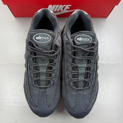 Nike black trainers with grey accents and iconic Air Max bubble sole.
