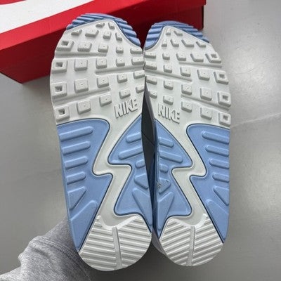Nike trainers white with smoke grey accents and signature swoosh logo.