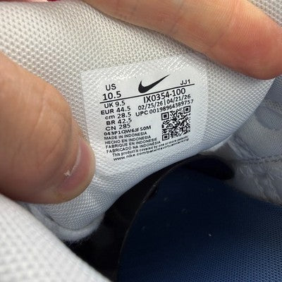Nike trainers white with smoke grey accents and signature swoosh logo.