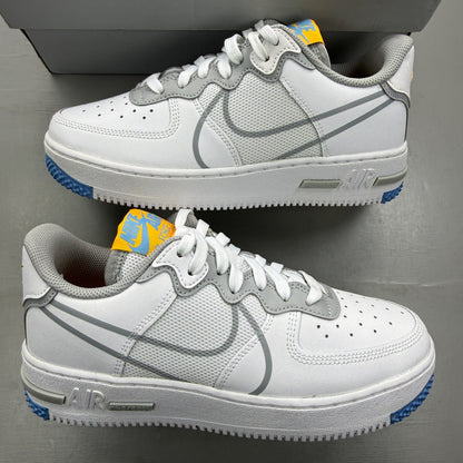 Nike Air Force 1 React white trainers with smoke grey accents and logo details.