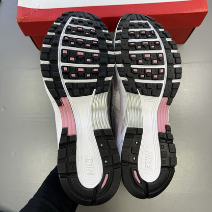 Nike P-6000 white trainers with elemental pink and silver accents, featuring logo details.