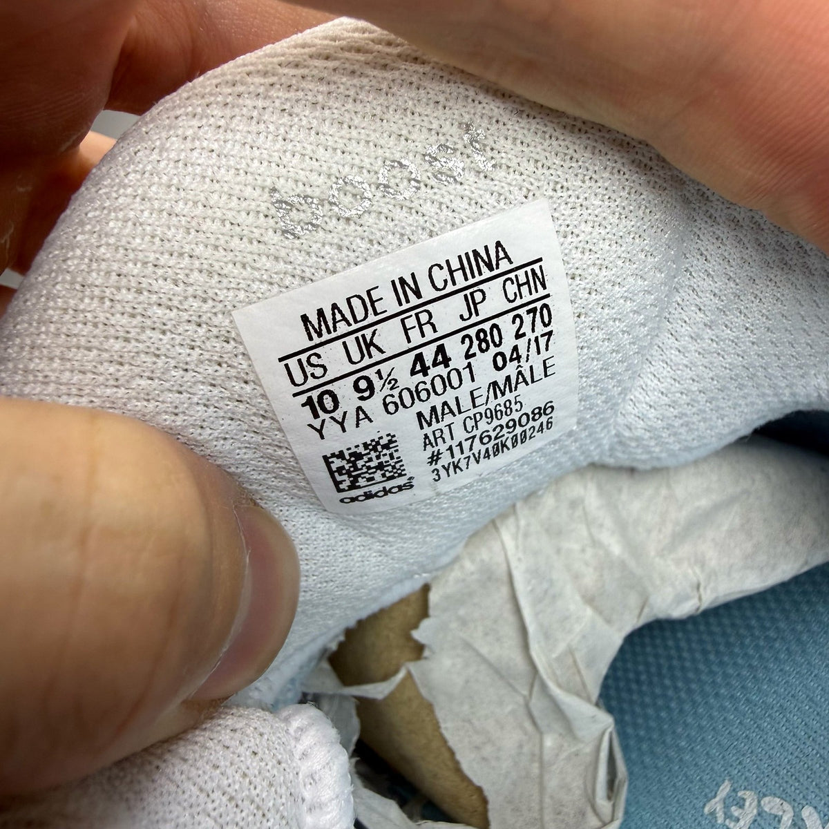 Adidas Ultra Boost 3.0 white trainers with Parley logo and breathable mesh upper.