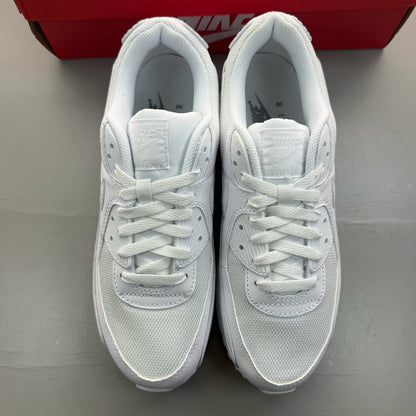 Nike Air Max 90 white trainers with iconic swoosh logo and breathable mesh material.