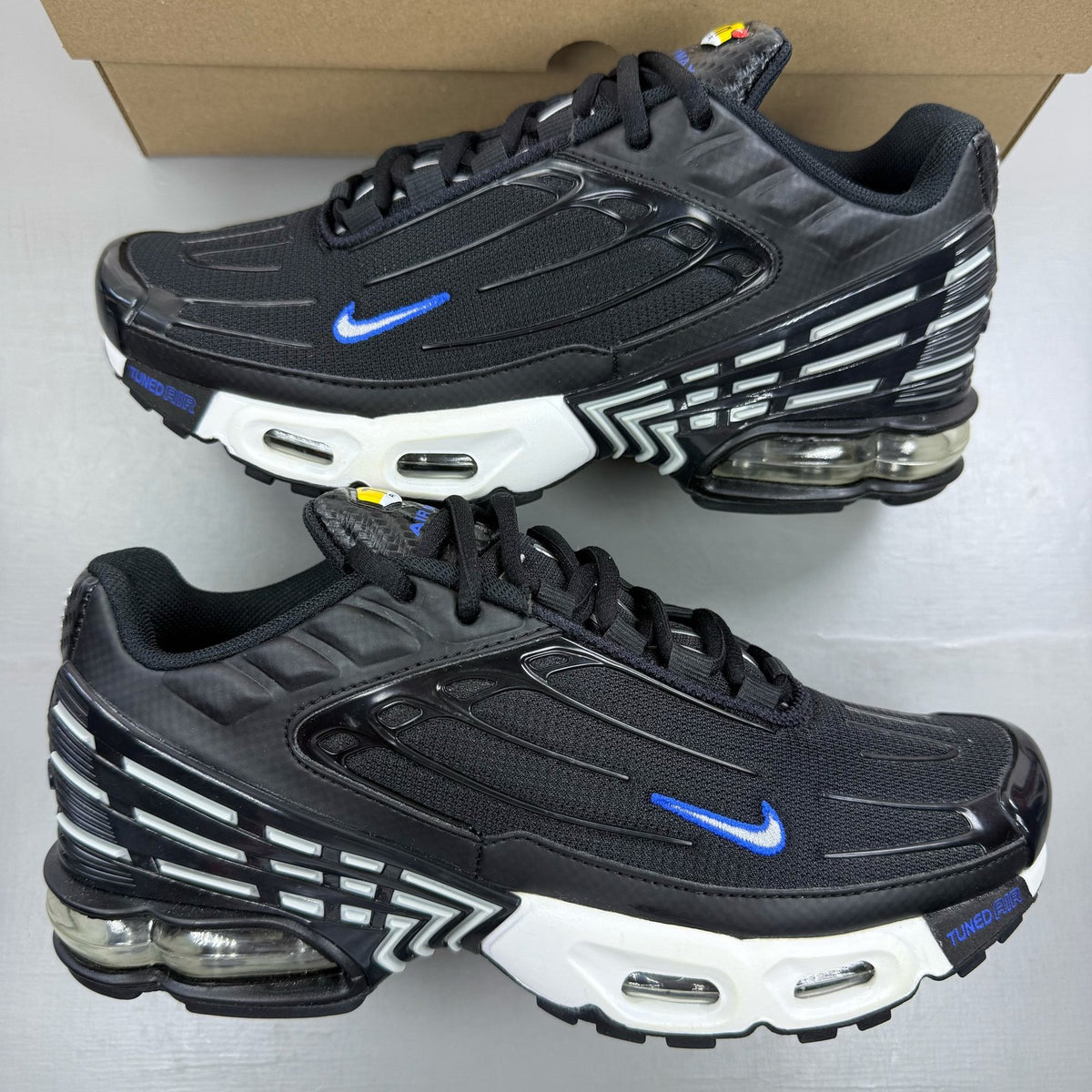 Nike black Air Max Plus TN 3 trainers with blue and silver accents, authentic design.