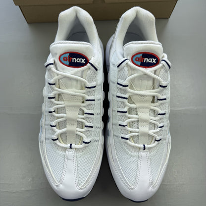 Nike Air Max 95 trainers white with blue and red accents, featuring iconic logo detailing.