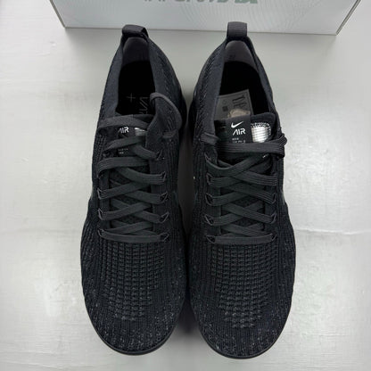 Nike Air VaporMax Flyknit 3 black sneakers with distinctive air cushioning and sleek design.