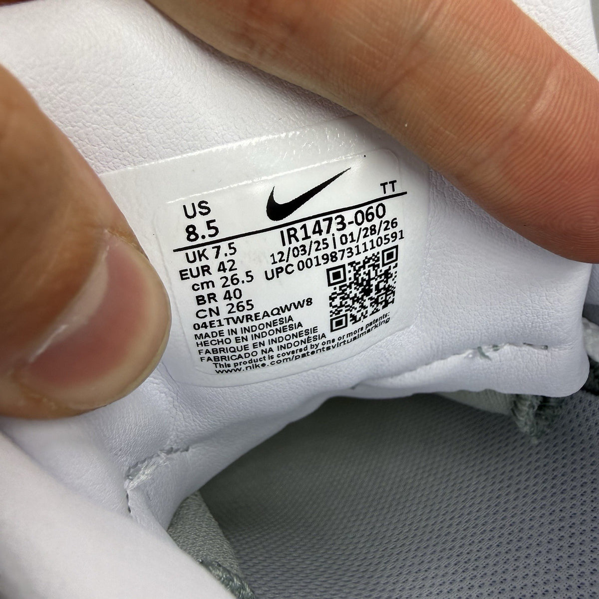 Nike Air Max 95 trainers white with turquoise and pink accents, big bubble design.