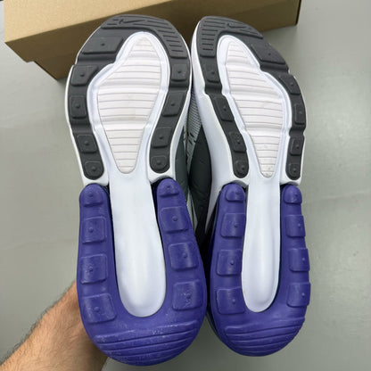 Nike Air Max 270 white trainers with Persian Violet accents and logo detail.