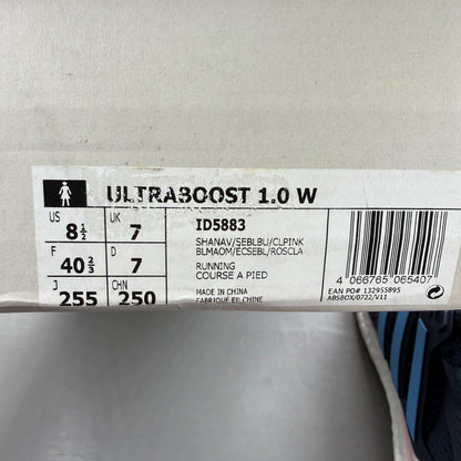 Adidas blue trainers with mesh upper and signature three stripes logo.