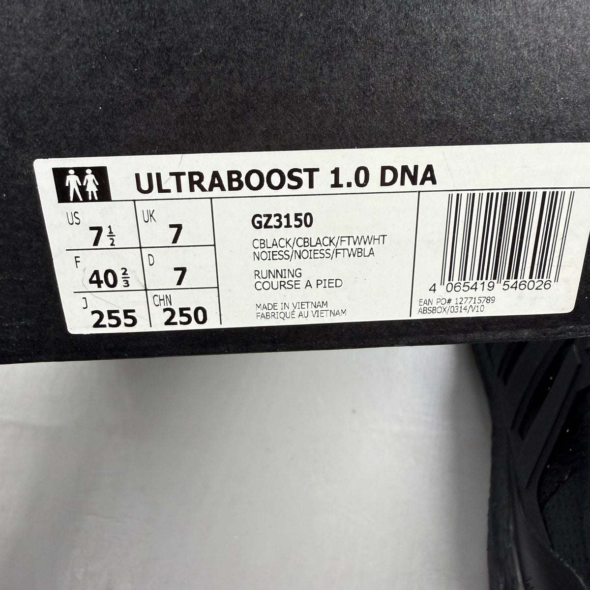 Adidas black Ultra Boost 1.0 trainers with core black and oreo toe design.