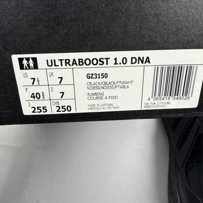 Adidas black Ultra Boost 1.0 trainers with core black and oreo toe design.
