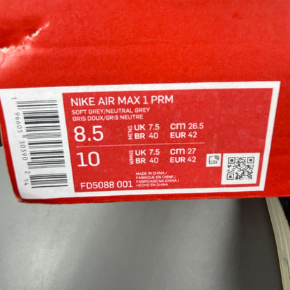 Nike grey deck shoes with premium crepe sole and logo detailing.