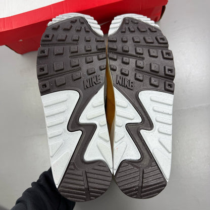 Nike beige trainers leopard tortoise shell pattern with logo detail.