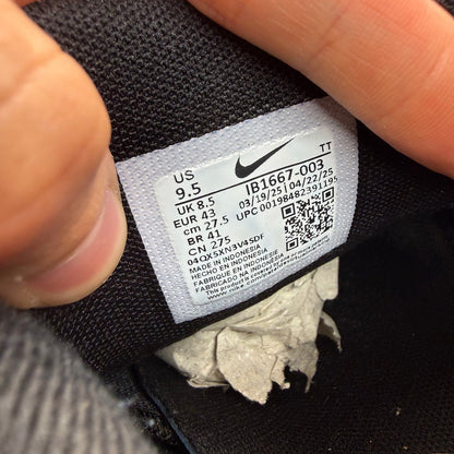 Nike Air Max 95 black sneakers with metallic silver accents and big bubble sole design.