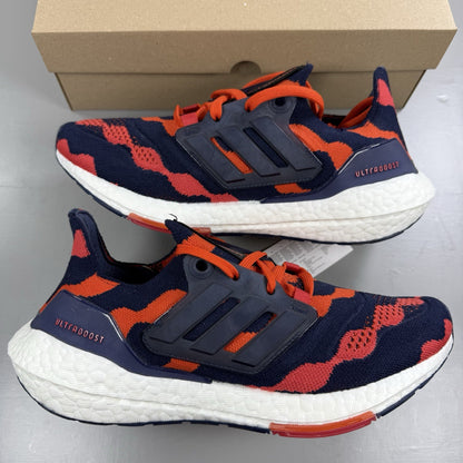 Adidas red Ultra Boost 22 trainers with Marimekko floral pattern and Parley branding.