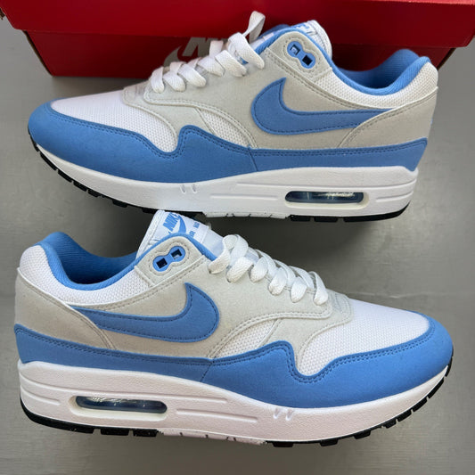 Nike running shoes blue with white accents and Air Max cushioning.