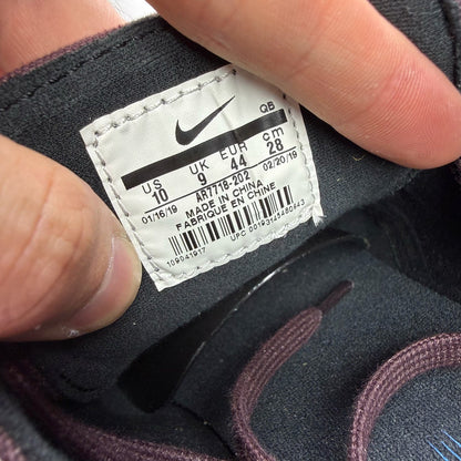 Nike SB Stefan Janoski burgundy trainers with gum sole and white accents.