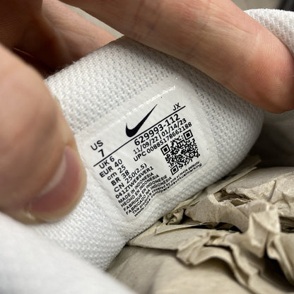 Nike Air Max Command trainers white with mesh upper and signature swoosh logo.