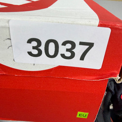 Nike deck shoes black with bright crimson accents and signature logo details.